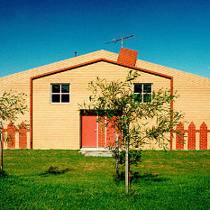 this primary school faces the street using a brick relief pattern like a child's drawing