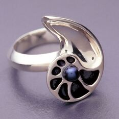 silver and black pearl ring inspired by a chambered nautilus, made by the architect