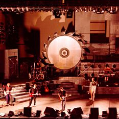 the ‘Cut’ tour stage design for the band Hunters & Collectors used industrial themes