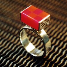 a sterling silver and acrylic ring with art deco influence
